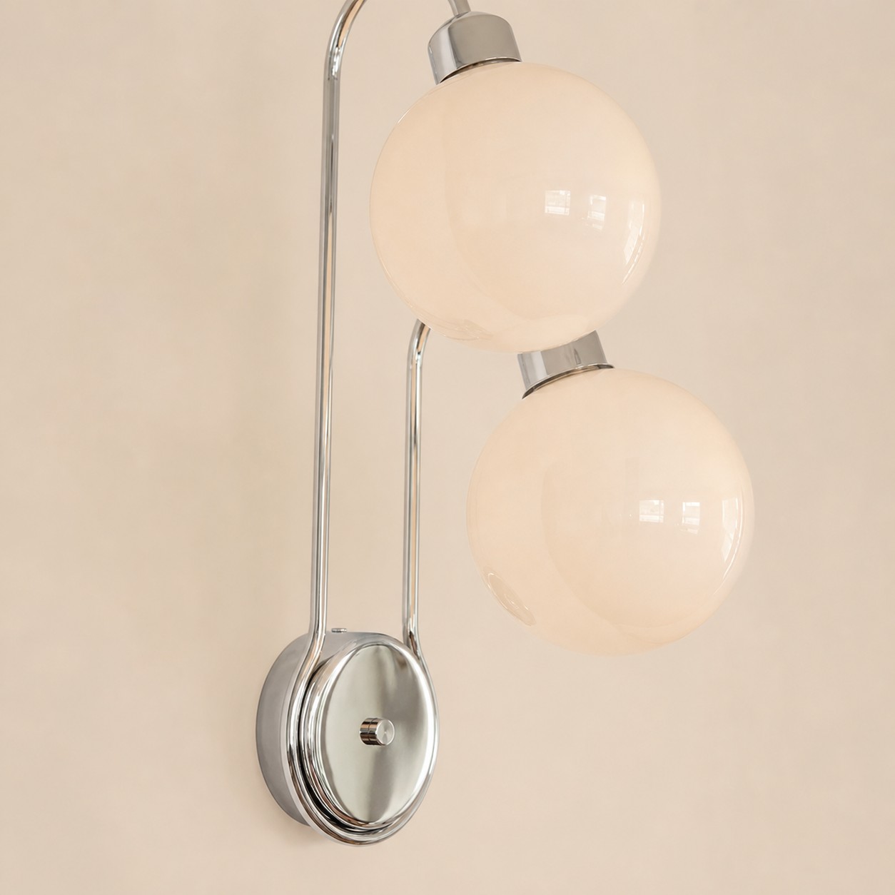 Close view of polished metal wall backplate