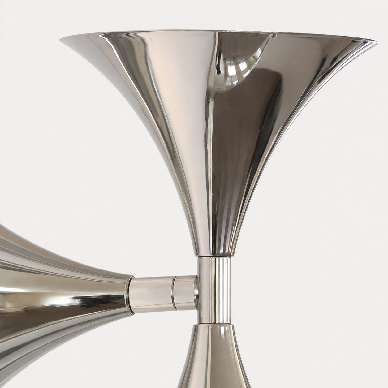 Polished chrome center joint and flared shade detail